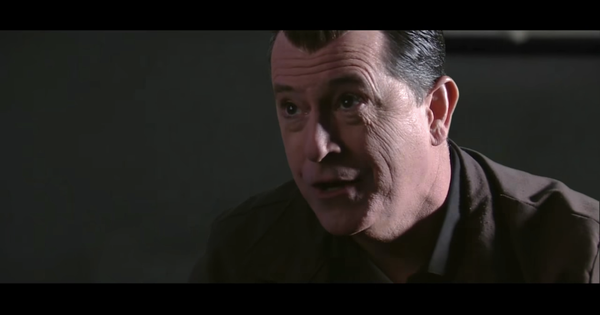 Stephenas Colbertas, nukreipiantis Keviną Spacey.