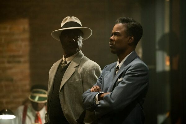 Loy (Chris Rock, prav z Glynn Turman) sredi kaosa nastajajoče vojne za trate še vedno uspe videti celotno sliko.