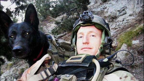 Nuke and dog handler Donovan Hunter in